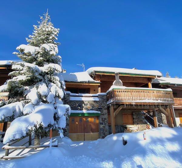 chalet Cosy en rondins en hiver